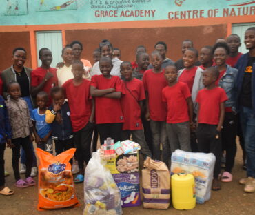 Volunteer with children in Kenya through UtuRise Foundation
