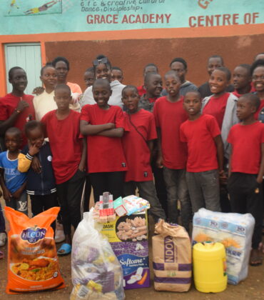 Volunteer with children in Kenya through UtuRise Foundation